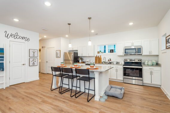 Apartment kitchen featuring an open floor plan