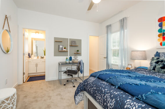 Bedroom furnished with a bed and desk