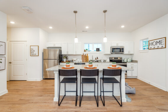 Apartment kitchen featuring an open floor plan